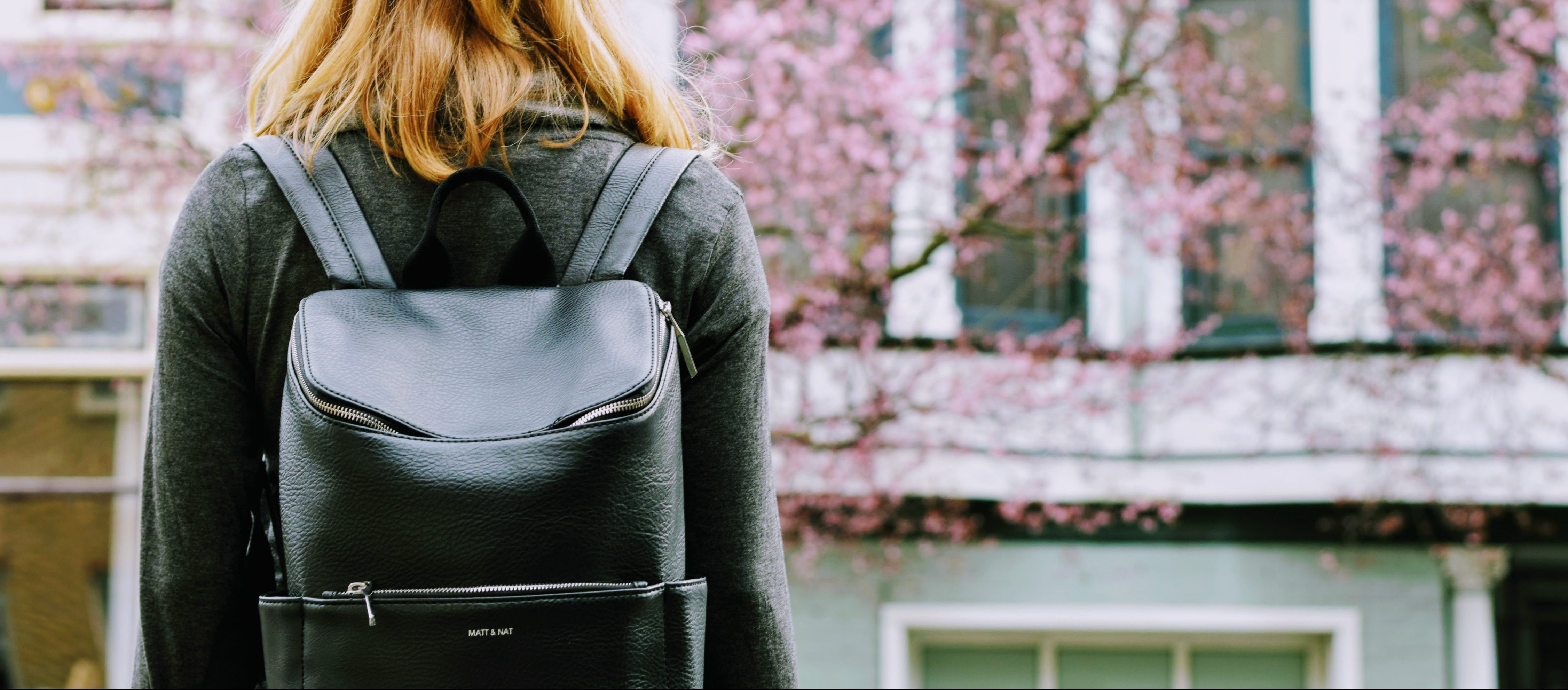 female student wearing backpack